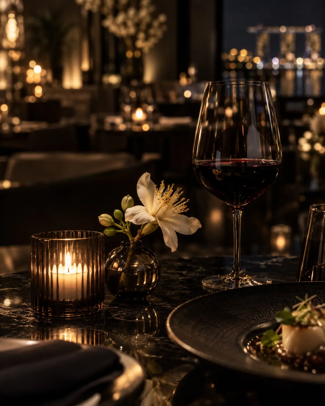 Tembusu blossom and wine after dark